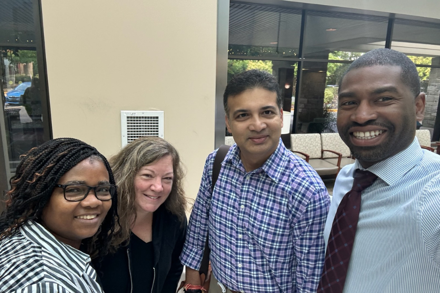 Some of the Malpractice Freaky Finders (Valiente on far left) with TUH President & CEO Abhi Rastogi (second from right).